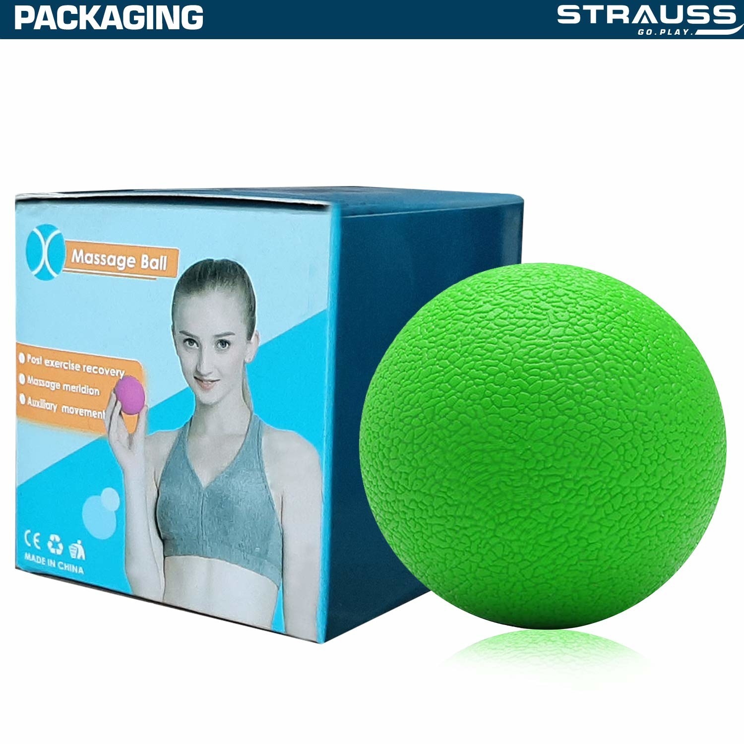 A green massage ball with the packaging 