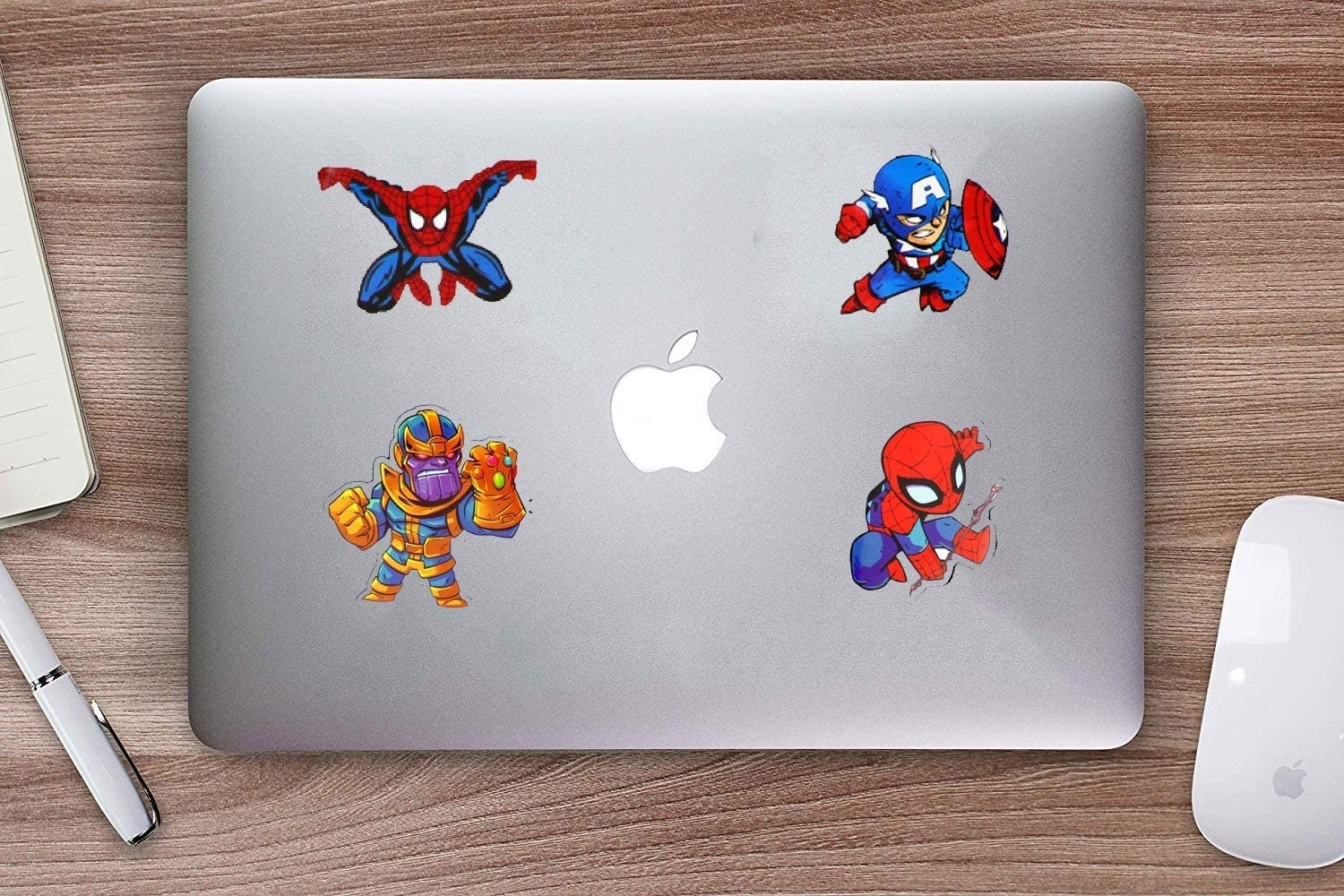 Four stickers on a laptop