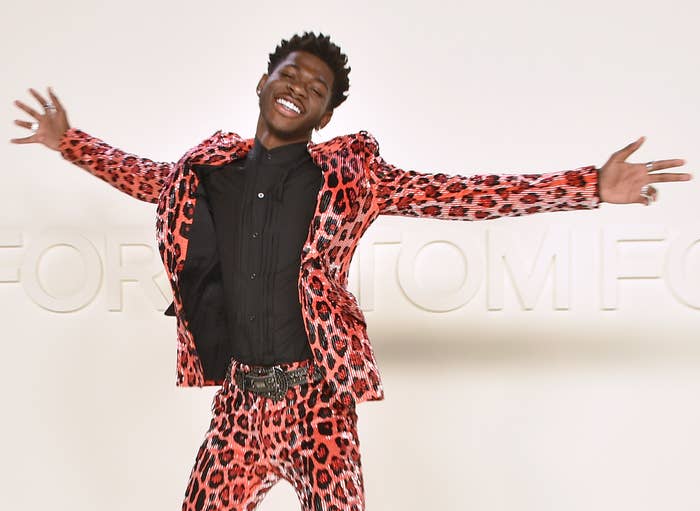 Lil Nas X jumps for joy at an event