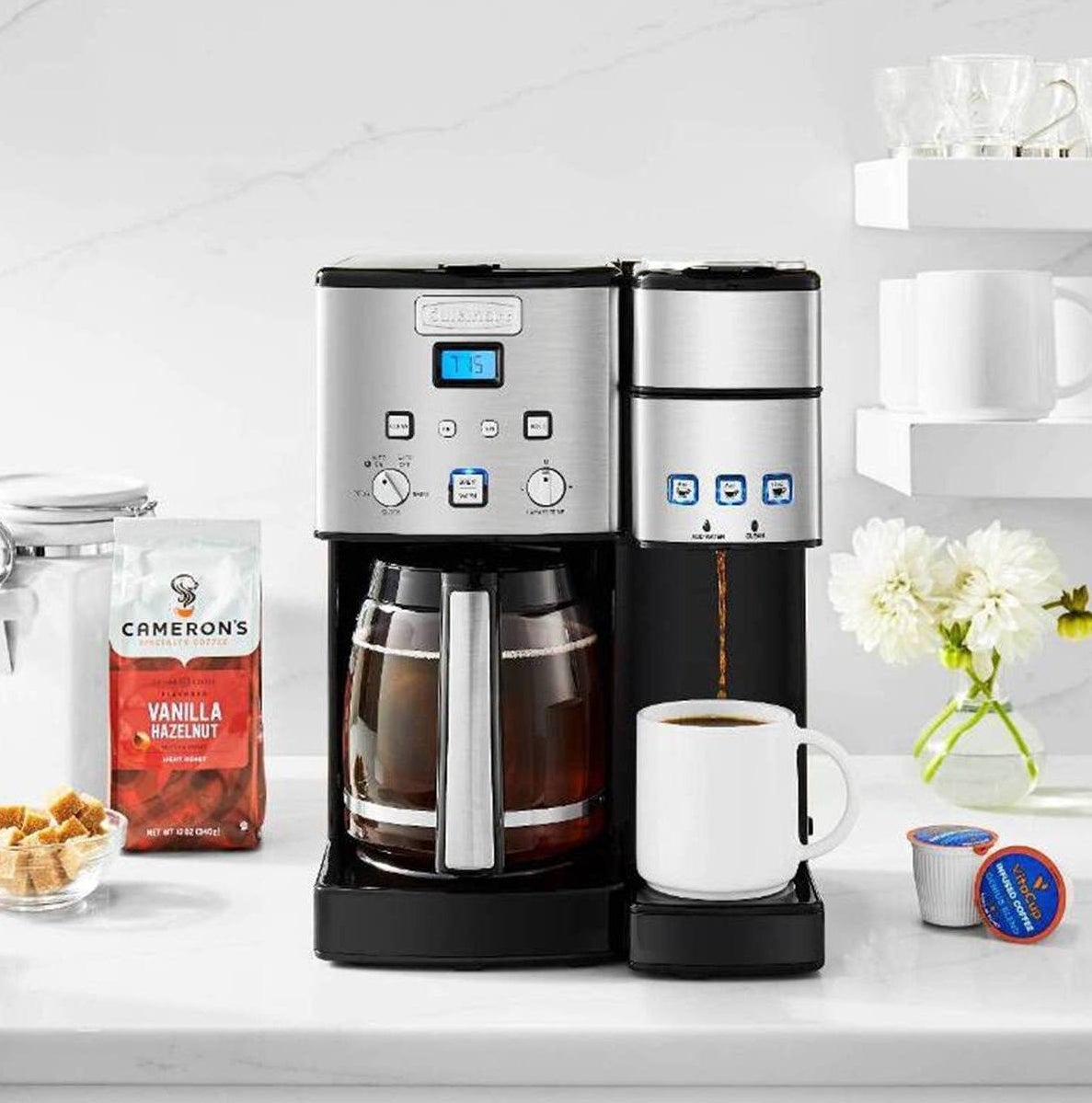 silver cuisinart coffee maker with a coffee pot and single serve brewer on a counter