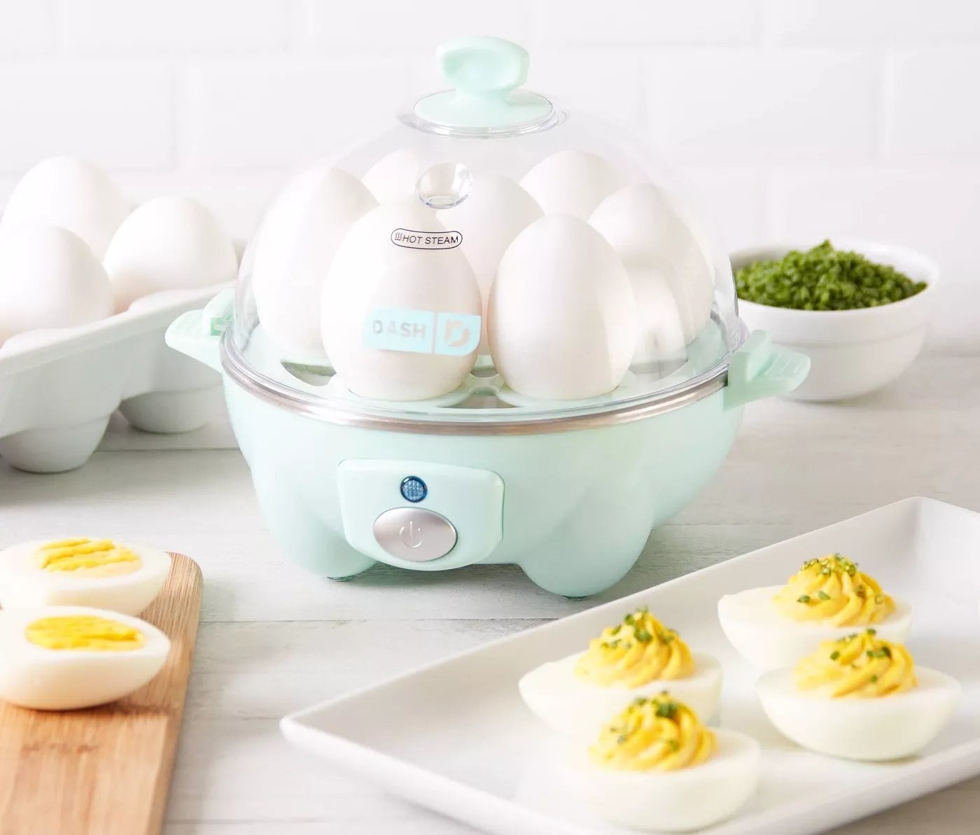 egg cooker on counter with deviled eggs