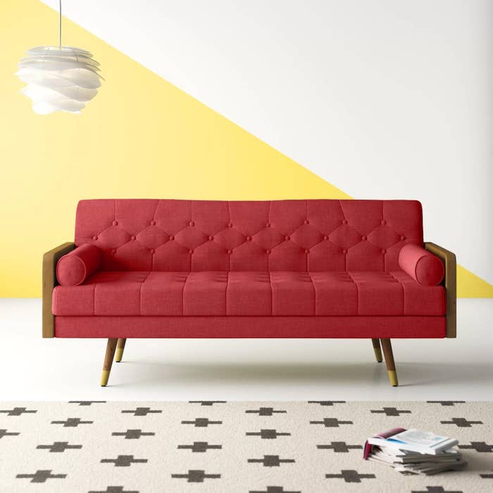 red tufted sofa