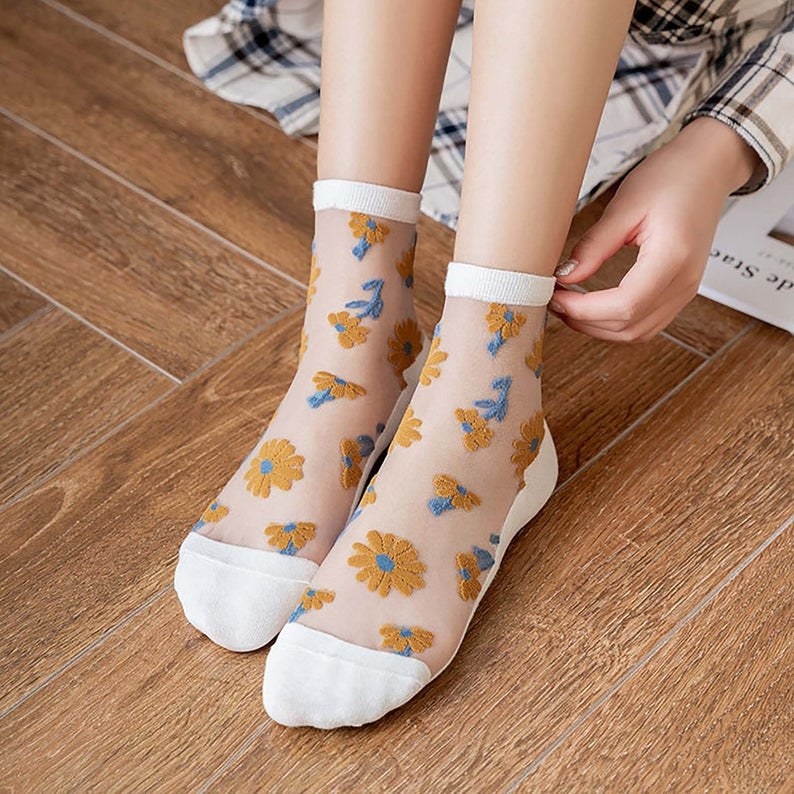 white sheer socks with yellow flowers on them
