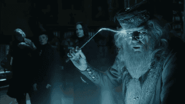 Dumbledore putting a memory into the Pensieve 