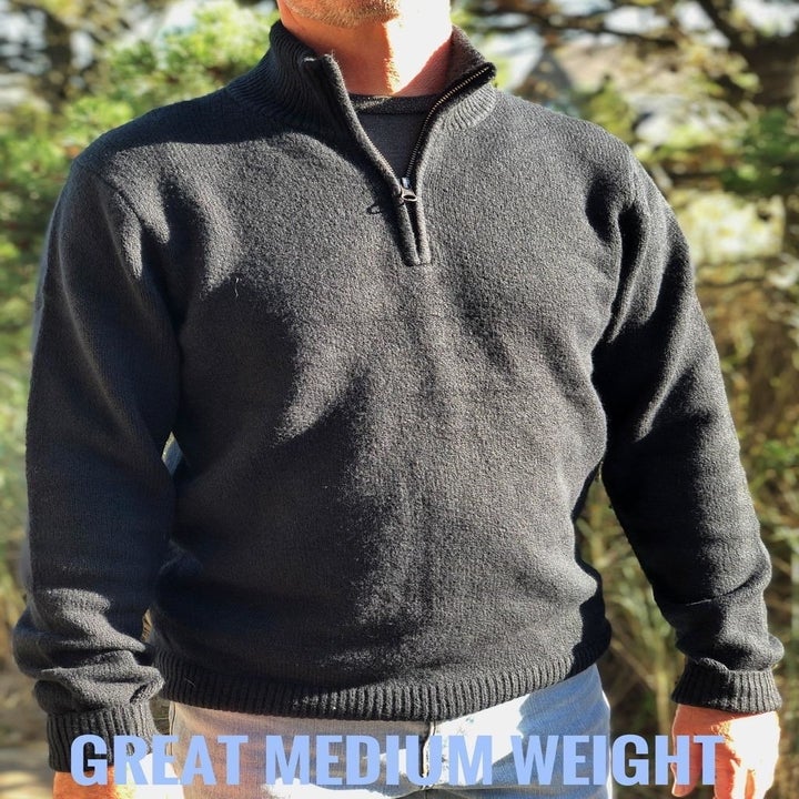 reviewer wearing quarter-zip sweater in charcoal