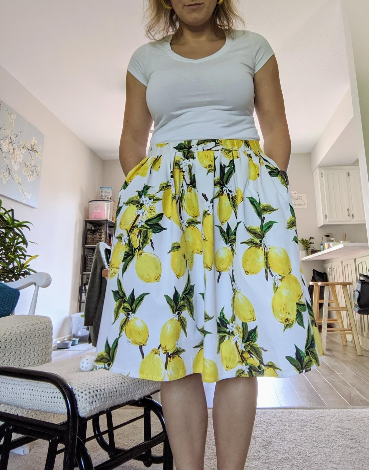 The dress with lemon print worn by an Amazon reviewer