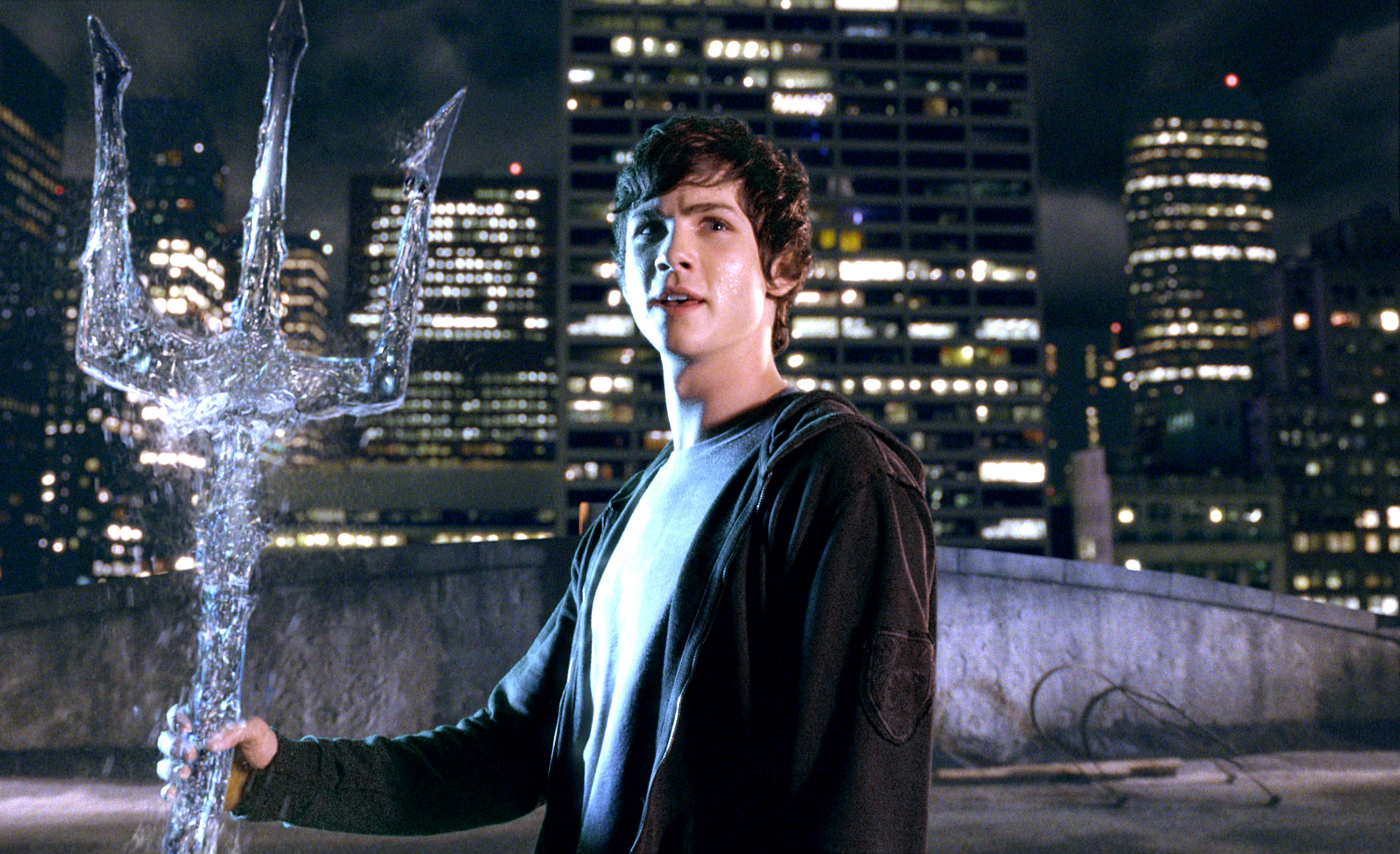 Logan holding a water trident in the film