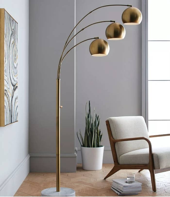 Gold floor lamp with marble base