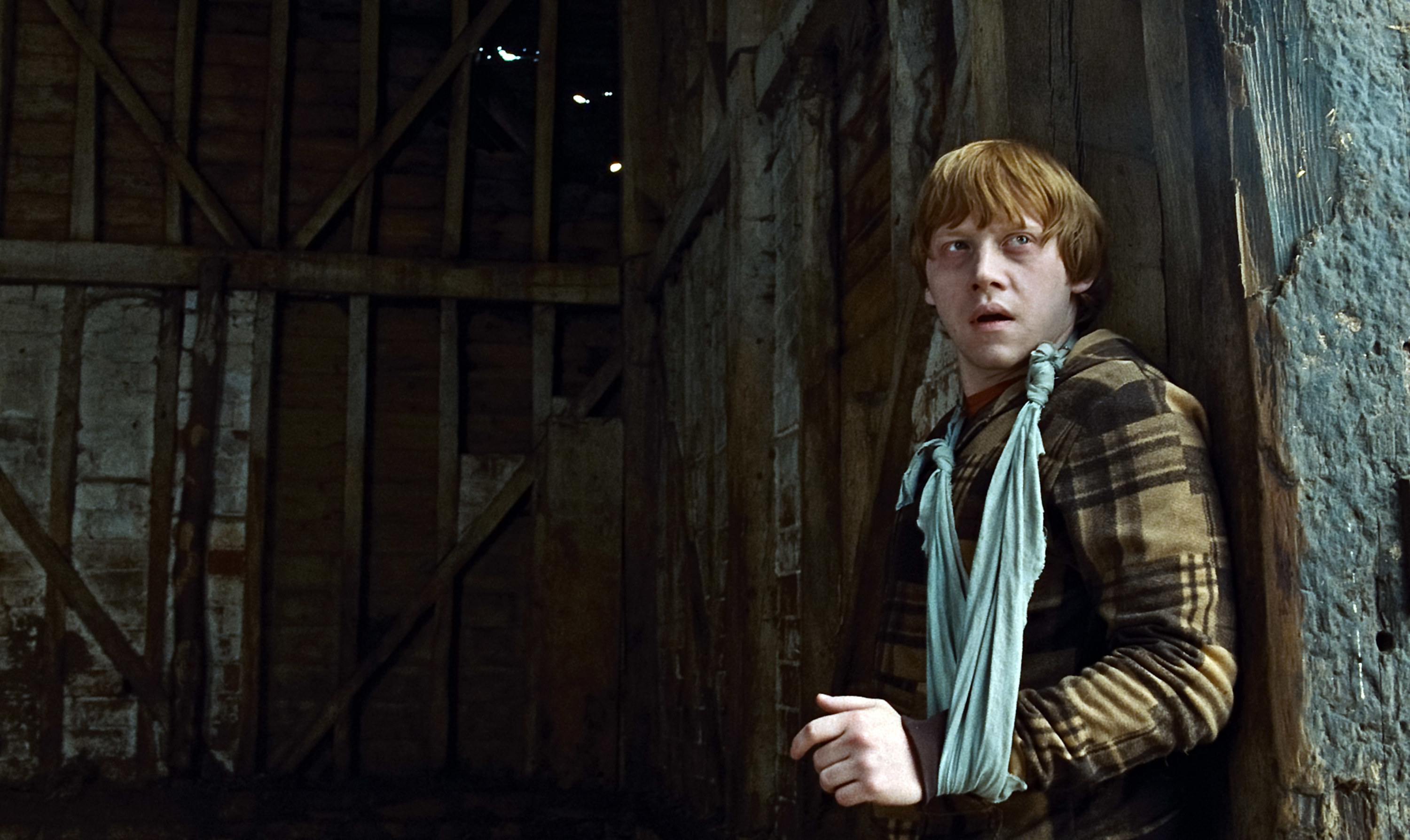 Rupert Grint with his arm in a cast in Harry Potter and the Deathly Hallows...