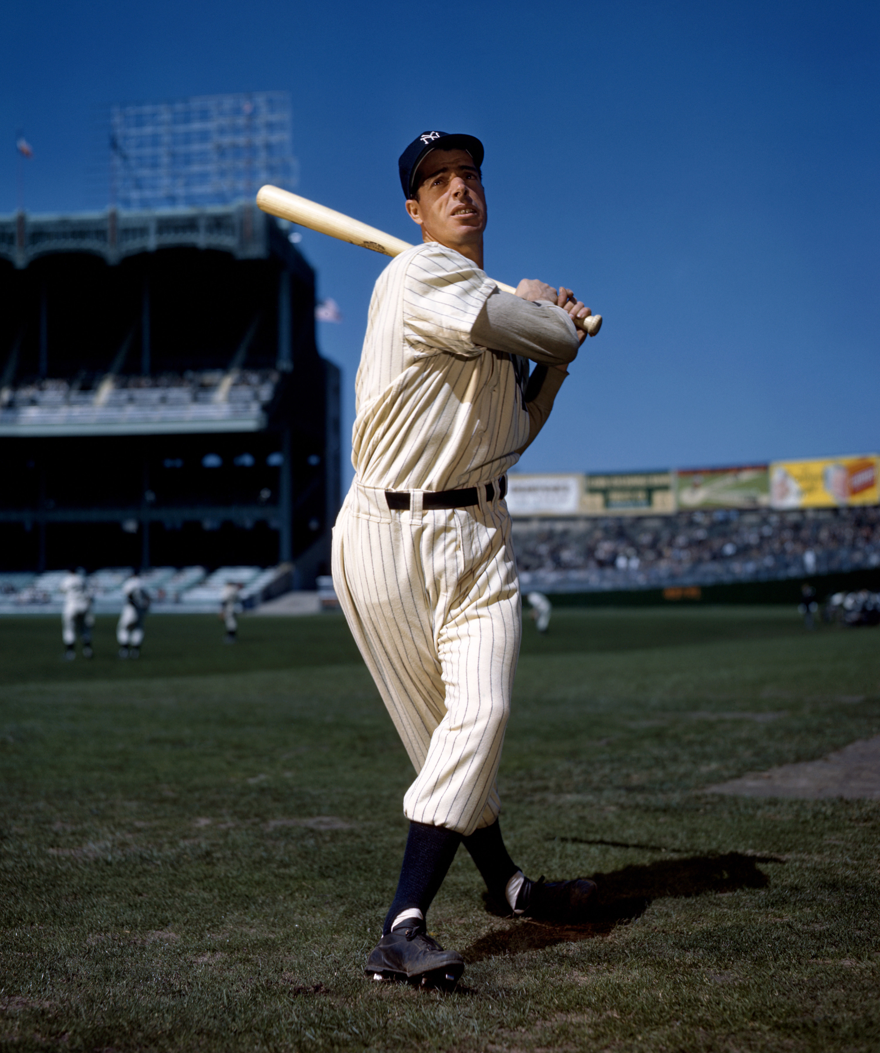 Joe Dimaggio taking a practice swing for the camera