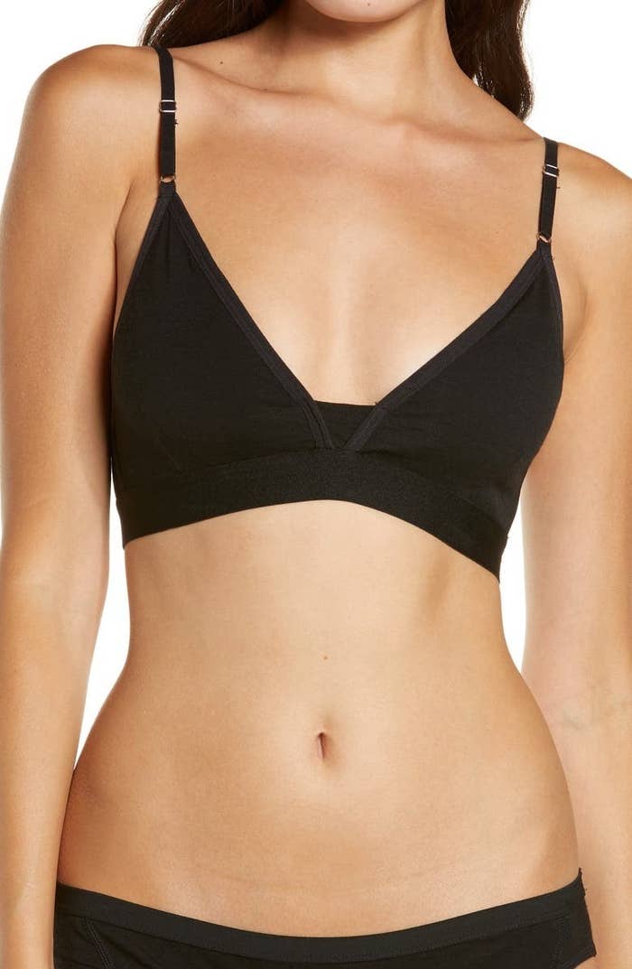 A model wears the black sports bra
