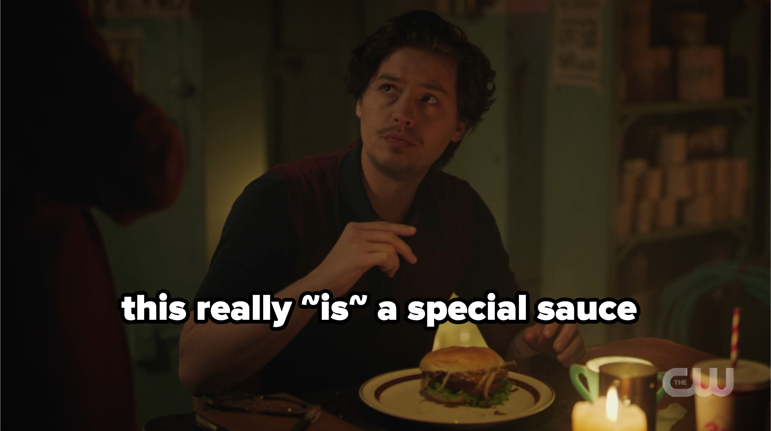 Jughead eating a hamburger with the caption &quot;this really ~is~ a special sauce&quot;