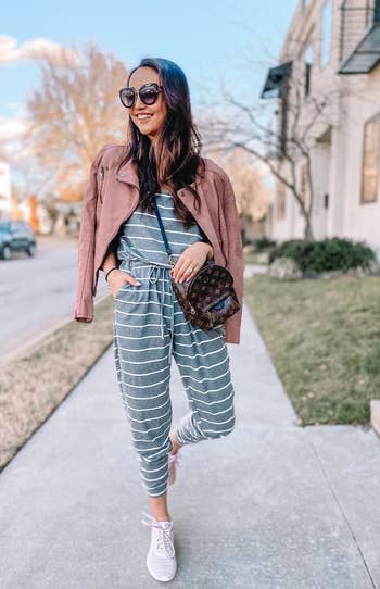Another reviewer wearing the grey striped jumpsuit