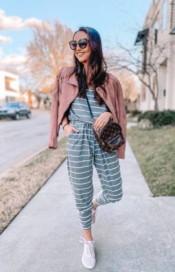 Another reviewer wearing the grey striped jumpsuit