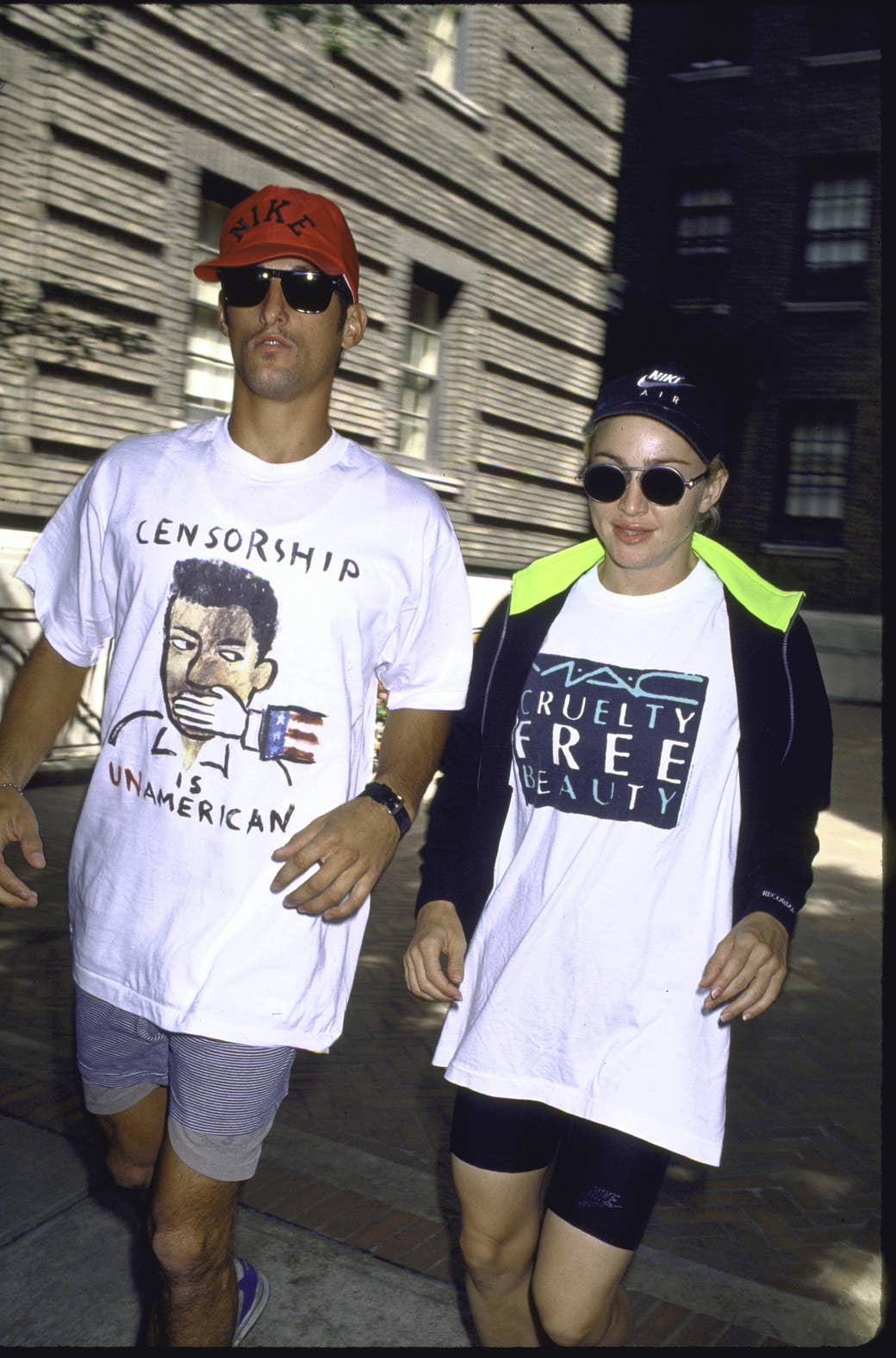 Madonna and a friend in t-shirts with activist slogans on them 