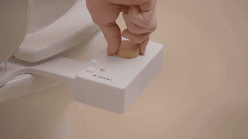 gif of person turning knob and bidet shooting water out