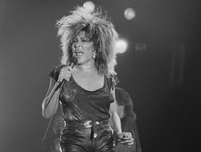 Black and white photo of Tina Turner performing in 1985