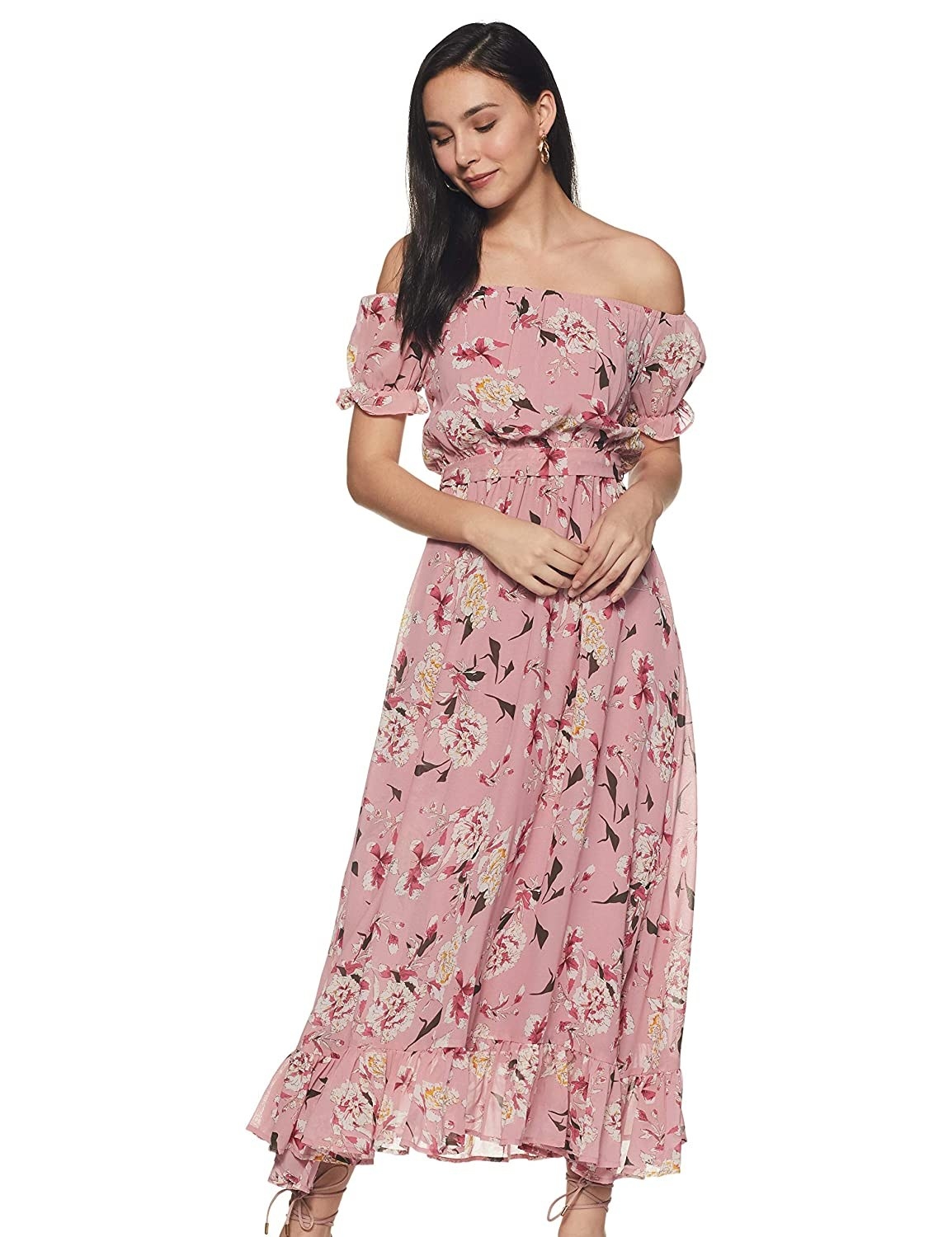 A woman wearing a floral dress 