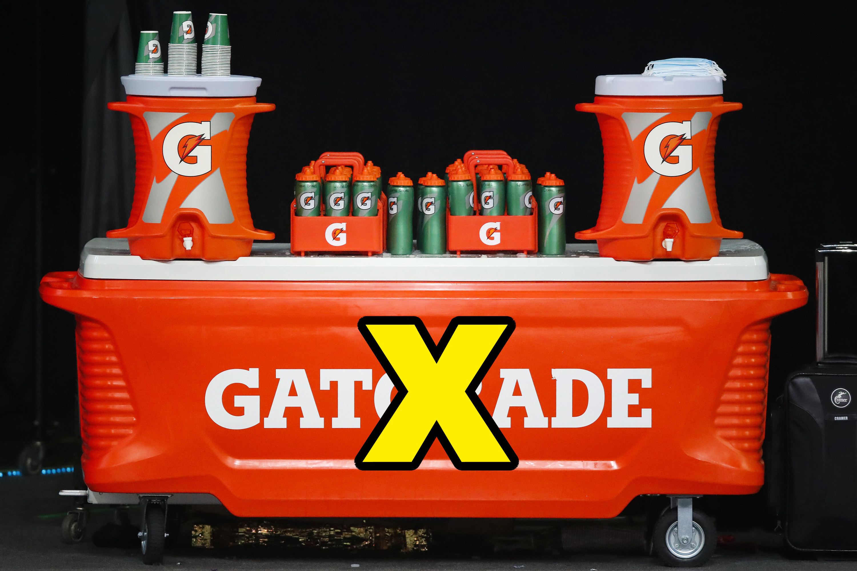 An X over a Gatorade cooler