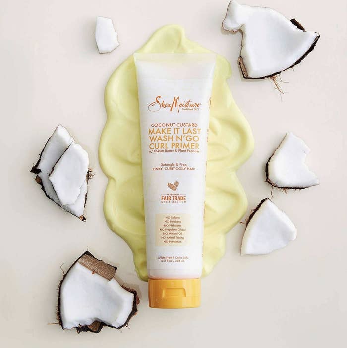 A tube of cream-gel curl primer with cut coconuts