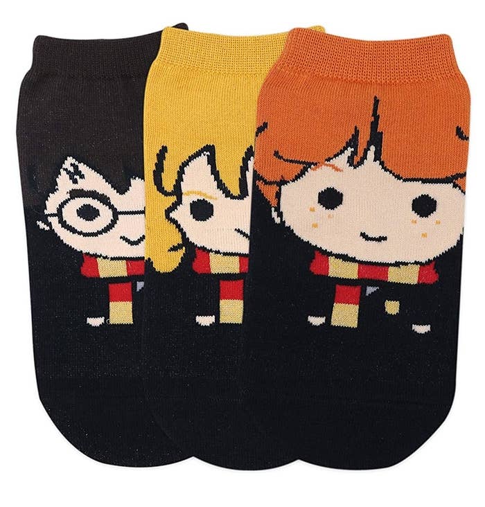 Three socks with Harry Potter, Ron Weasley, and Hermione Granger prints