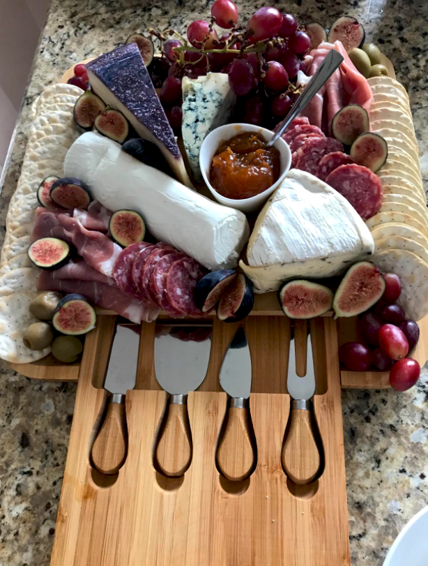 reviewer image of board styled with cheeses and fruits