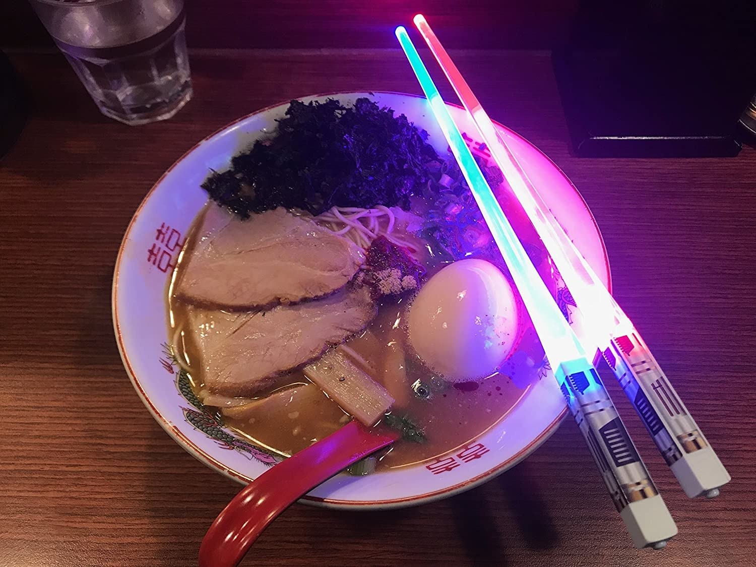the chopsticks on a bowl
