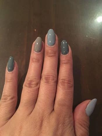 Reviewer showing off shiny nails after using top and base coat