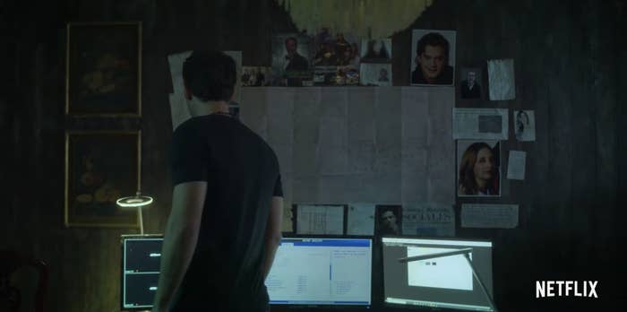 A wall full of photos and notes in Who Killed Sara?