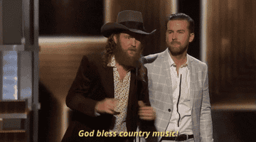 man yelling &quot;God bless country music!&quot; at the ACMs