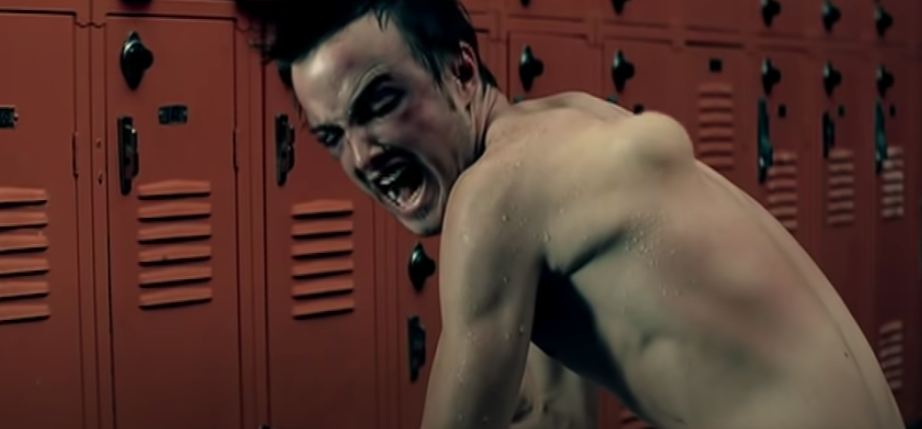 aaron paul with a large bump on his back