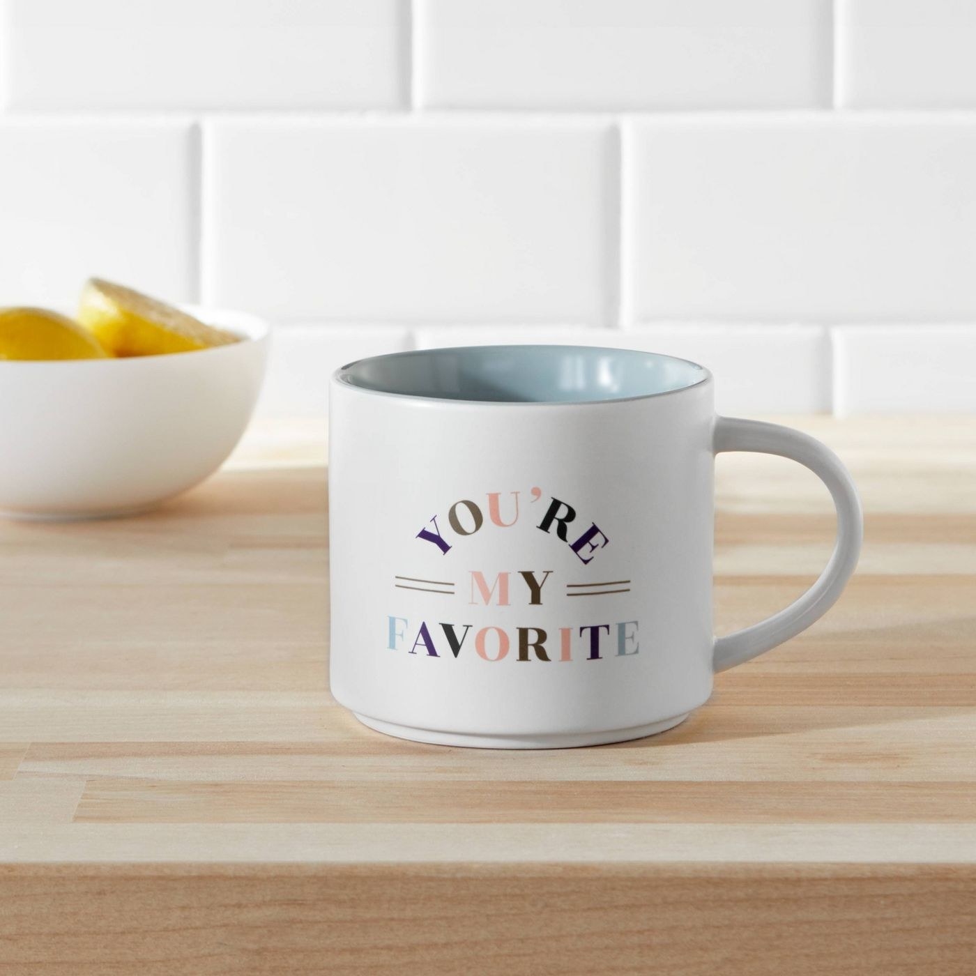 White and rainbow mug with pale blue inside