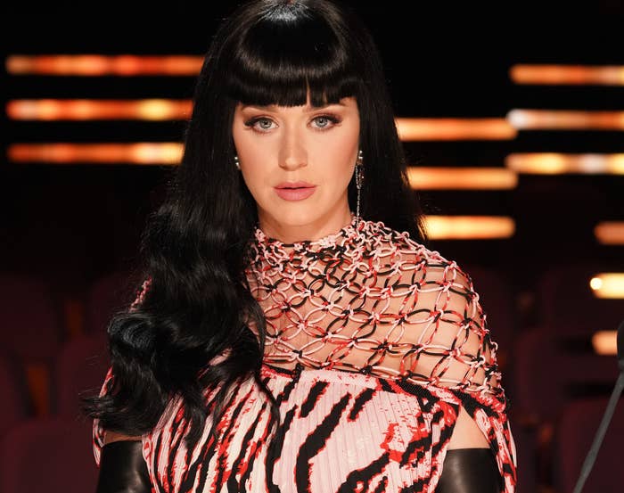 Katy shows off black hair and bangs on set