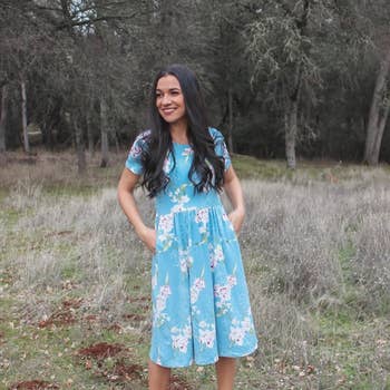 another reviewer wearing it in light blue floral pattern