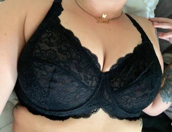 A reviewer wearing the bra in black 