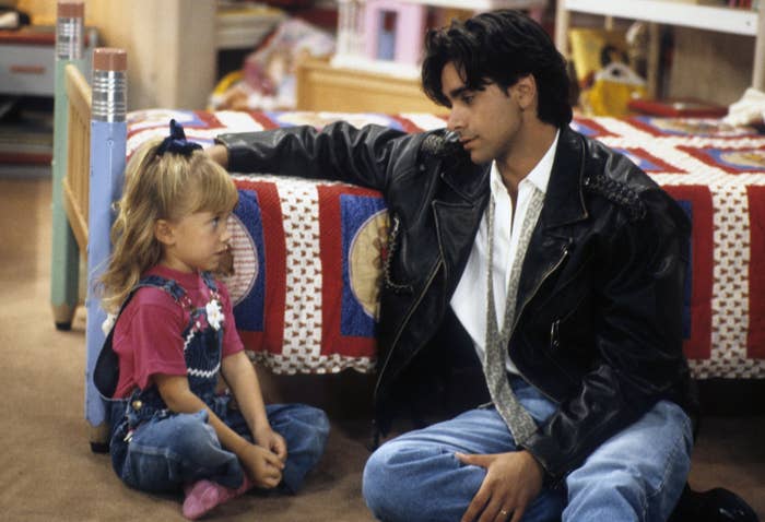 John and one of the Olsen twins on the "Full House" set