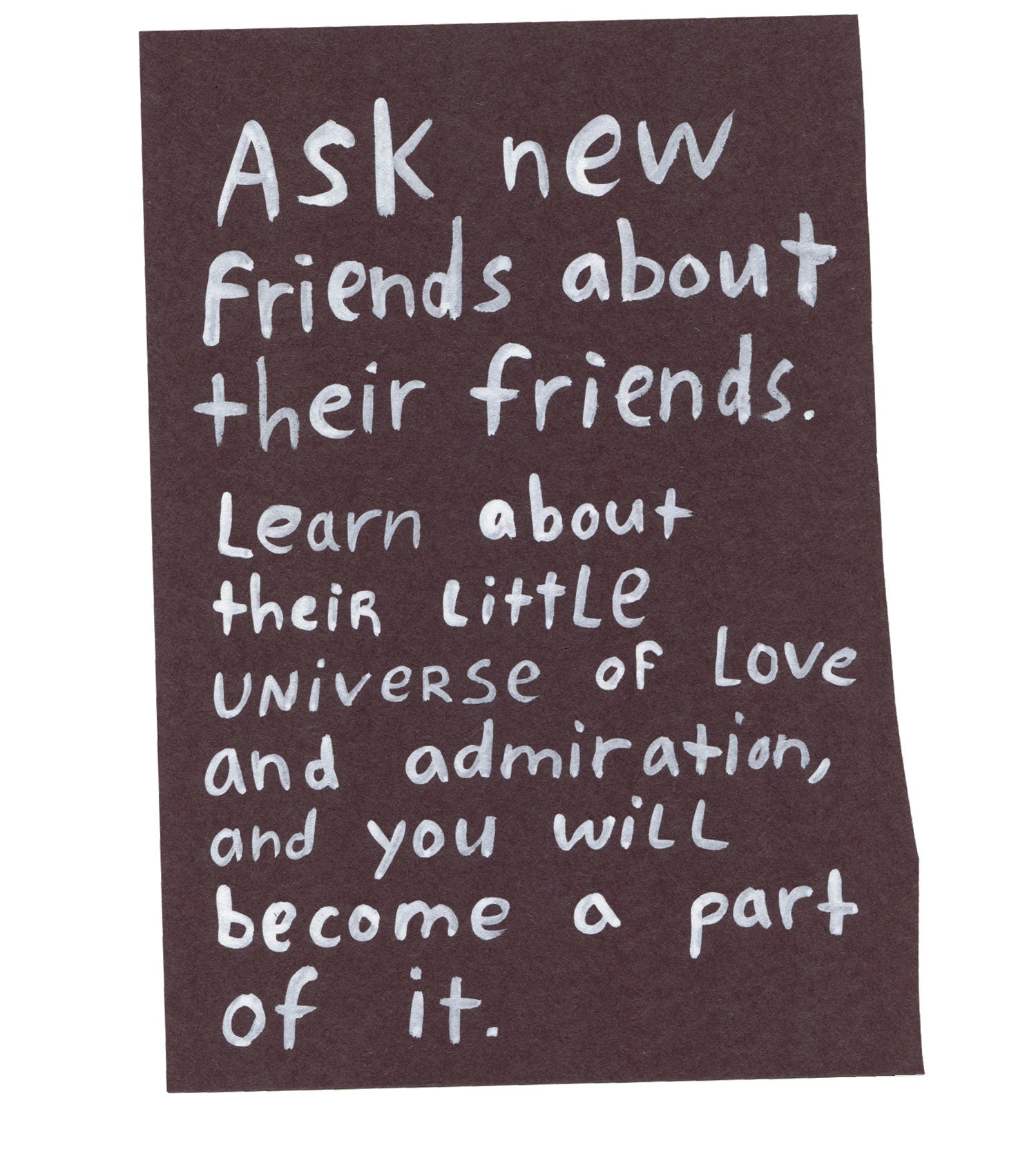 Handwritten text on torn piece of colored paper: &quot;Ask new friends about their friends. Learn about their little universe of love and admiration, and you will become a part of it.&quot;