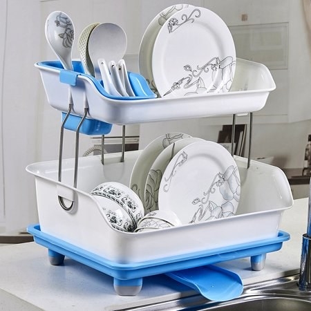 the two-tier blue dish rack which has a spout to let water drain into a sink