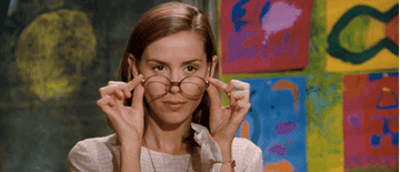 Miss Honey lowers her glasses in wonder in a clip from matilda