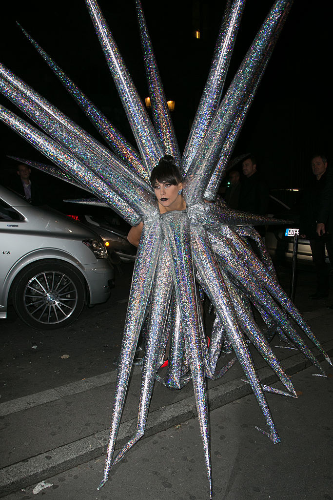 Gaga stepping out of her car in a dress that&#x27;s all holographic spikes