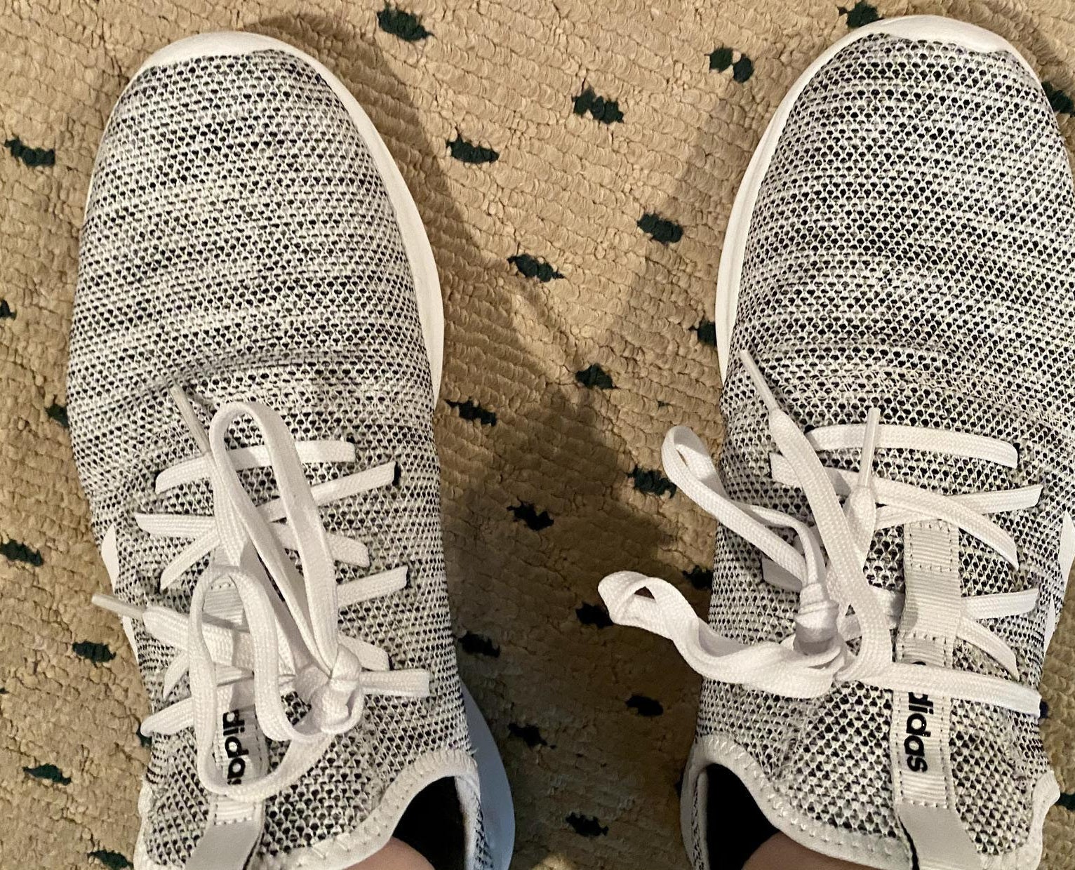 buzzfeed editor&#x27;s grey and white fabric sneakers