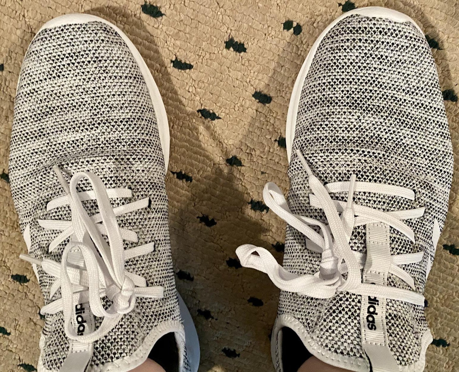 buzzfeed editor&#x27;s grey and white fabric sneakers