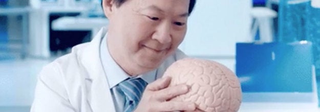 Dr. Ken Jeong looking lovingly at a brain