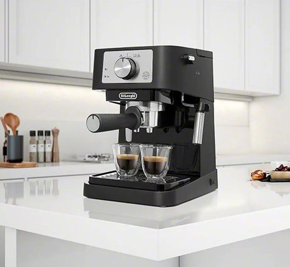 The machine brewing espresso