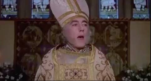 Priest in dramatic outfit
