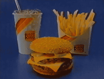 Burger King cheeseburger, fries, and beverage