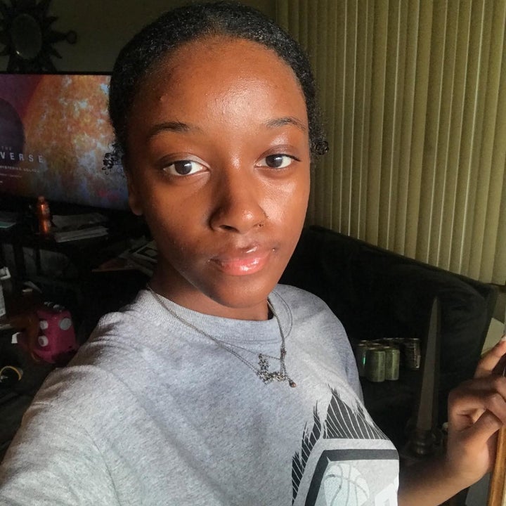 reviewer with glowing skin 