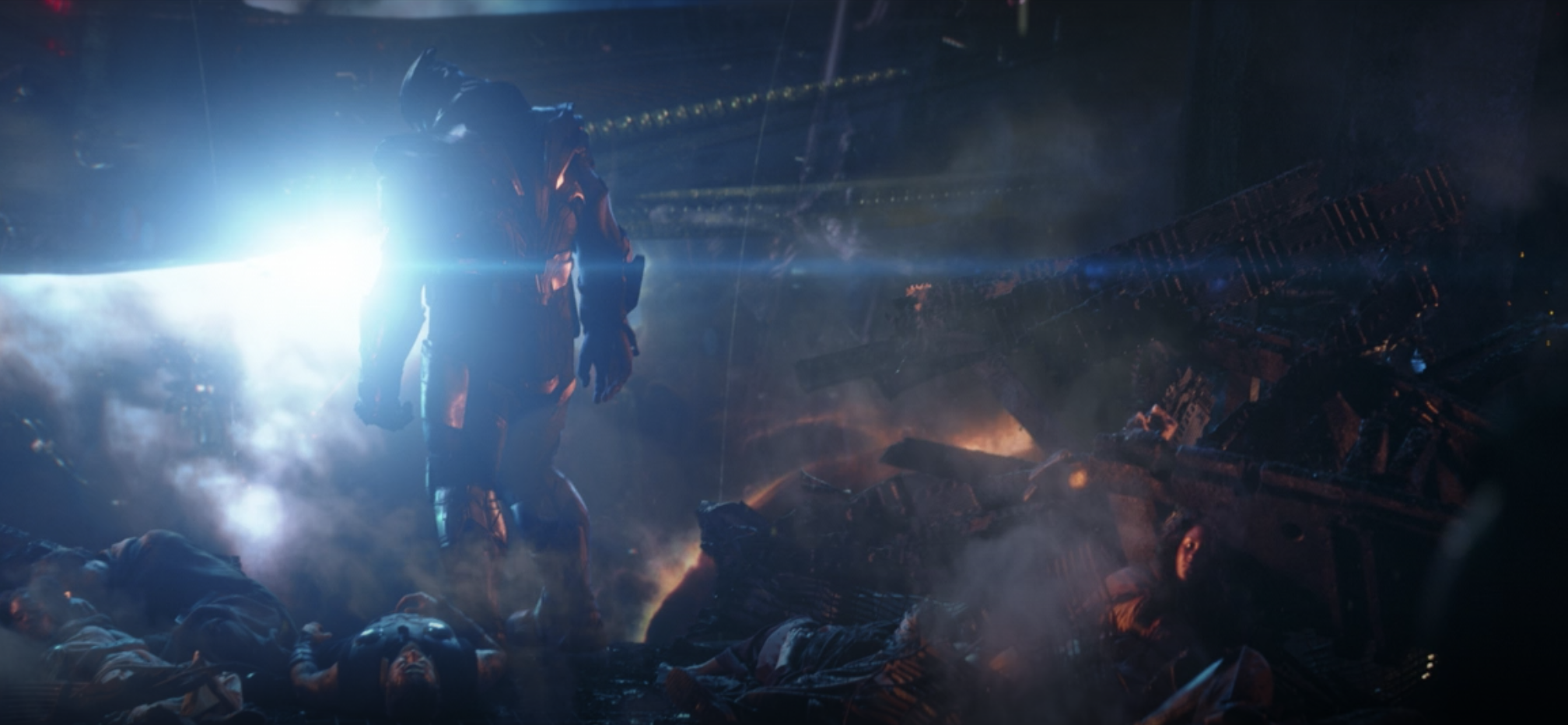 Thanos standing over bodies in the ship