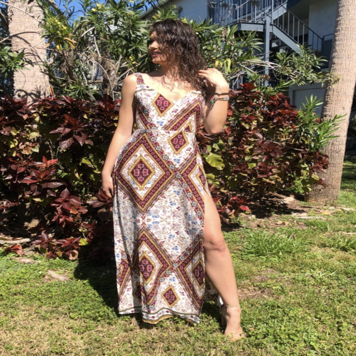 reviewer wearing the printed maxi dress