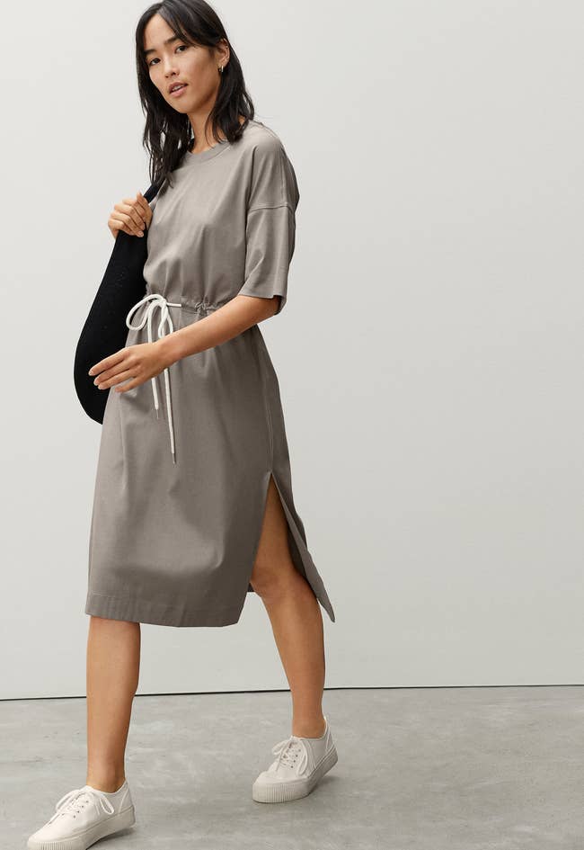 model wearing the grey dress
